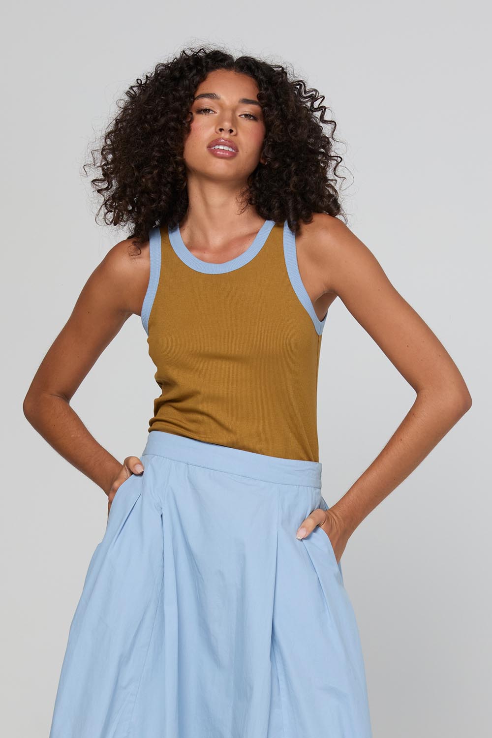 Model Genericm wearing size sample of the Bellissimo Tank – Icedchai in colour Icedchai, in a cropped view