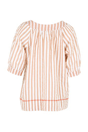 Product shot of the Bliss Top – Sandy in colour Sandy, from the back