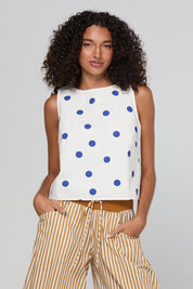 Model Genericm wearing size sample of the Rose Top – Polkadot in colour Polkadot, in a cropped view