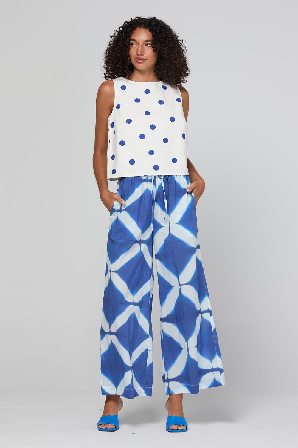 Model Genericm wearing size sample of the Rose Top – Polkadot in colour Polkadot, from the front