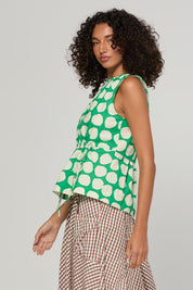 Model Genericm wearing size sample of the Carmen Top – Circulo in colour Circulo, from an angle