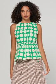 Model Genericm wearing size sample of the Carmen Top – Circulo in colour Circulo, in a cropped view