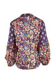 Product shot of the Mittee Top in colour Cella (Blue), from the back