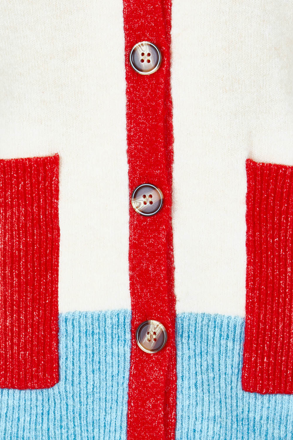 Product shot of the Poet Cardigan in colour Cream, detail