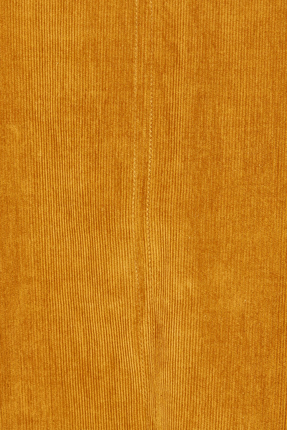 Product shot of the Eva Cotton Cord Dress in colour Marigold, detail