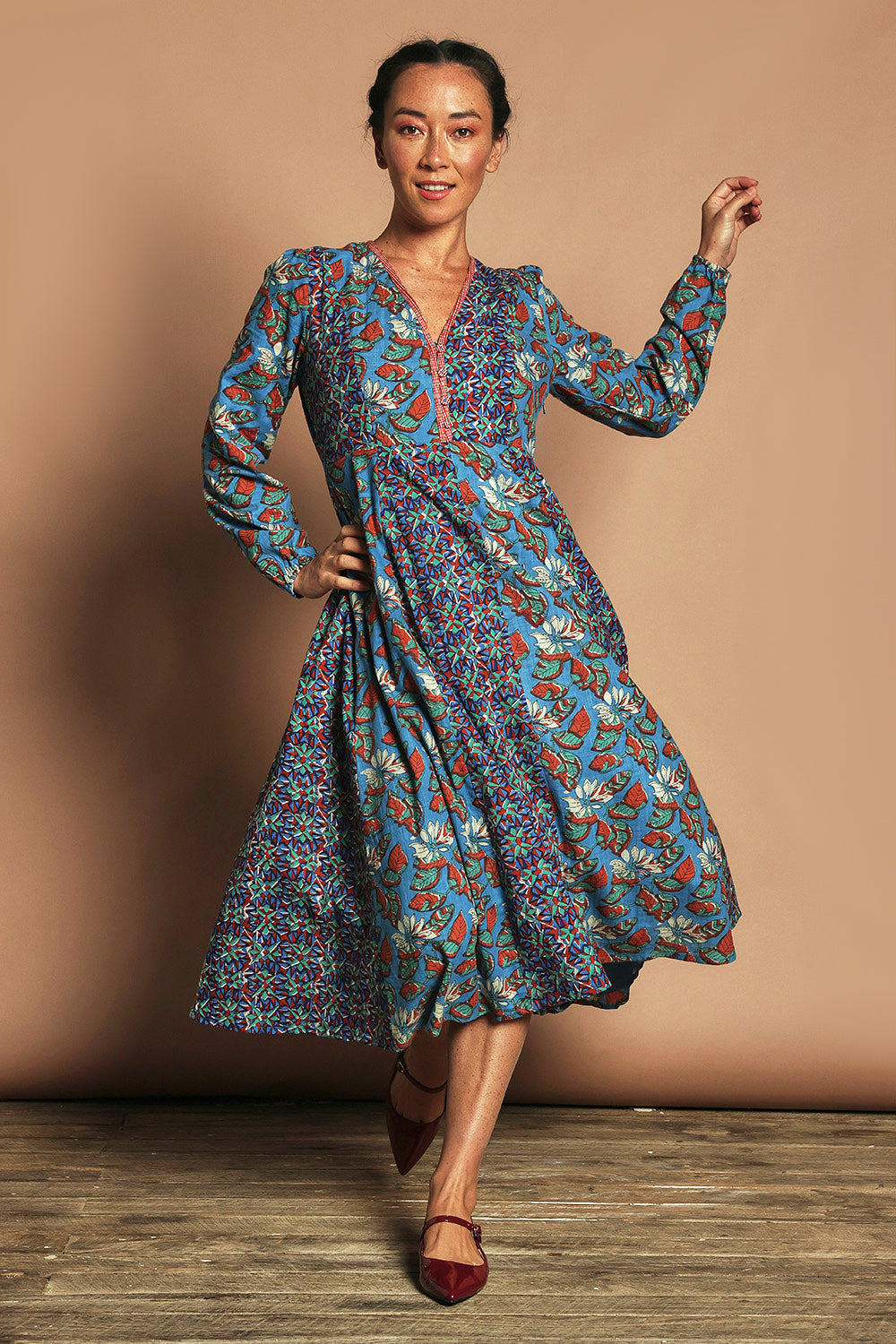 Model Katie wearing size 10 of the Lettie Cotton Dress in colour Lettie (Blue), from the front, showing the whole outfit