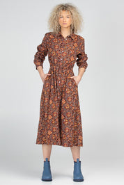 A model wearing the Juliette Cotton Dress in colour Juliette, from the front, showing the whole outfit