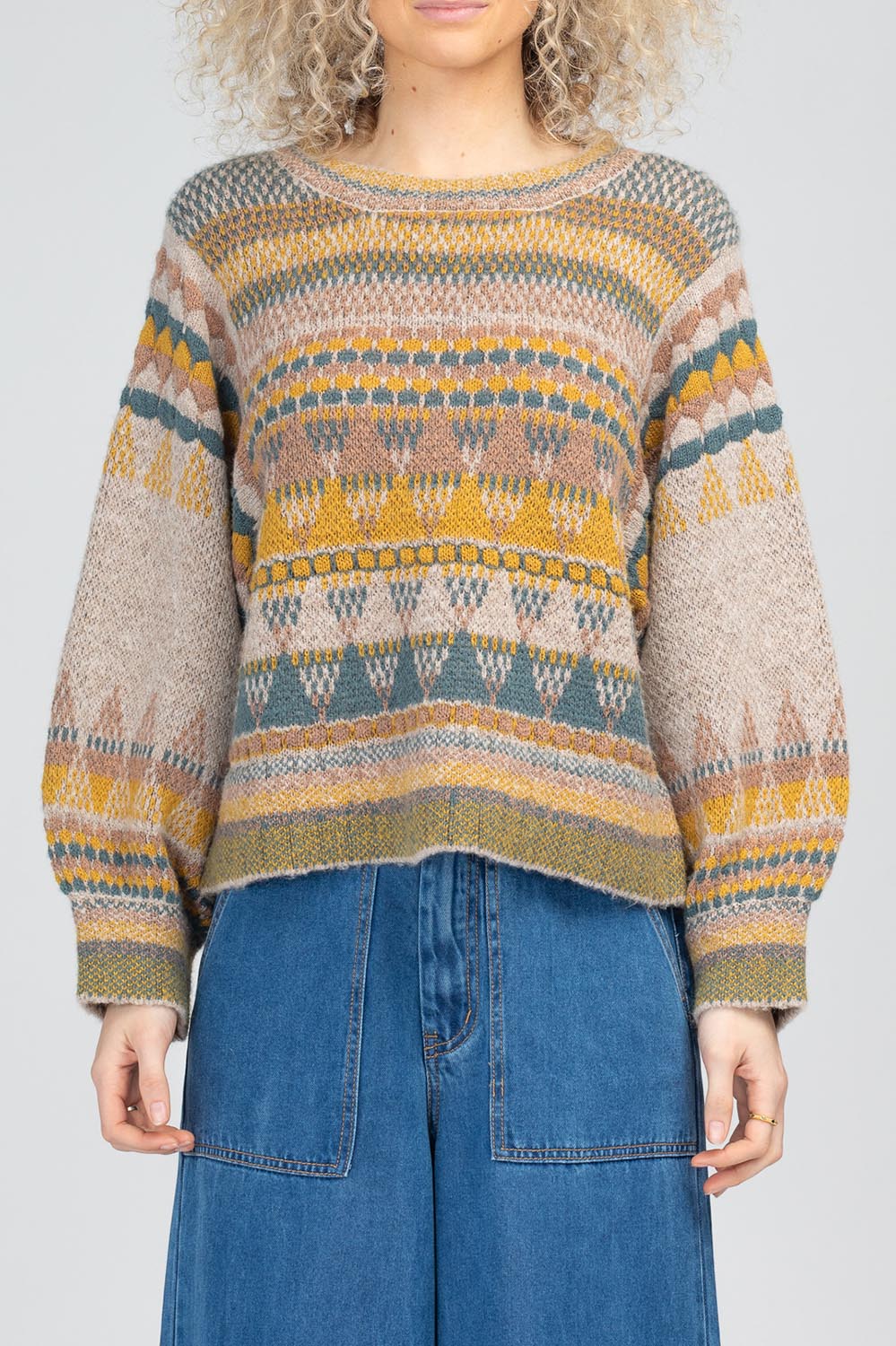 A model wearing the Sofia Wool Blend Jumper in colour Oatmeal, from the front, cropped image