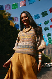 A model wearing the Sofia Wool Blend Jumper in colour Oatmeal, from the front, showing the whole outfit