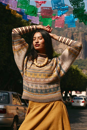 A model wearing the Sofia Wool Blend Jumper in colour Oatmeal, from the front, showing the whole outfit