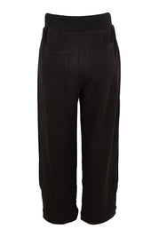 Product shot of the Guru Cotton Blend Track in colour Black (Black), from the back