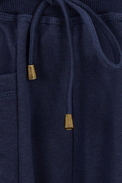 Product shot of the Guru Cotton Blend Track in colour Navy (Blue), detail