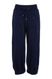 Product shot of the Guru Cotton Blend Track in colour Navy (Blue), from the front