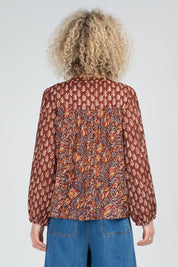 A model wearing the Fleetwood Cotton Top in colour Juliette, from the back