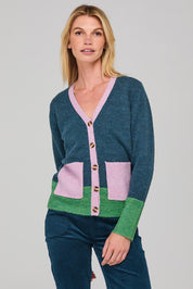 A model wearing the Poet Cardigan in colour Bluemulti (Blue), from the front, cropped image