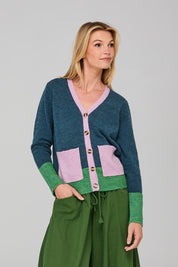 A model wearing the Poet Cardigan in colour Bluemulti (Blue), from the front, cropped image