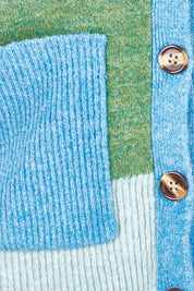 Product shot of the Poet Cardigan in colour Green (Green), detail