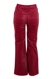 Product shot of the Dharma Pant in colour Cranberry (Red), from the back