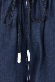 Product shot of the Jonte Pant in colour Navy (Blue), detail