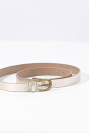 A model wearing size OneSize of the Jenna Belt in colour Gold (Metallics), from the front, showing the whole outfit
