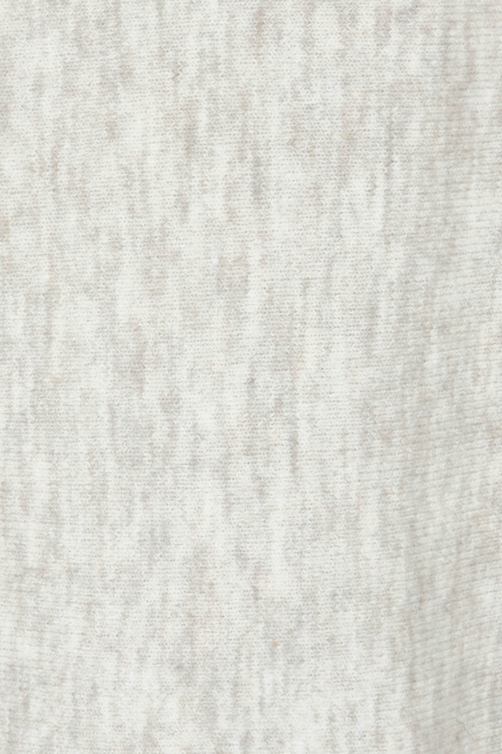 Product shot of the Saintly Knit in colour Parchment, detail