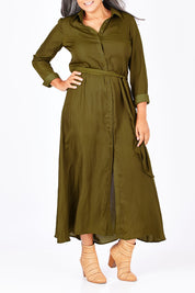 Model Nadine wearing size S of the Safari Dress in colour Moss (Green), from the front, cropped image