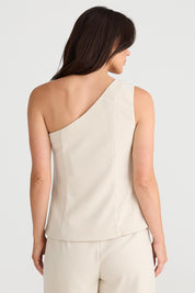 A model wearing the Rozalia Asymmetric Top in colour Oyster, from the back