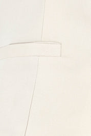 Product shot of the Rozalia Asymmetric Top in colour Oyster, detail