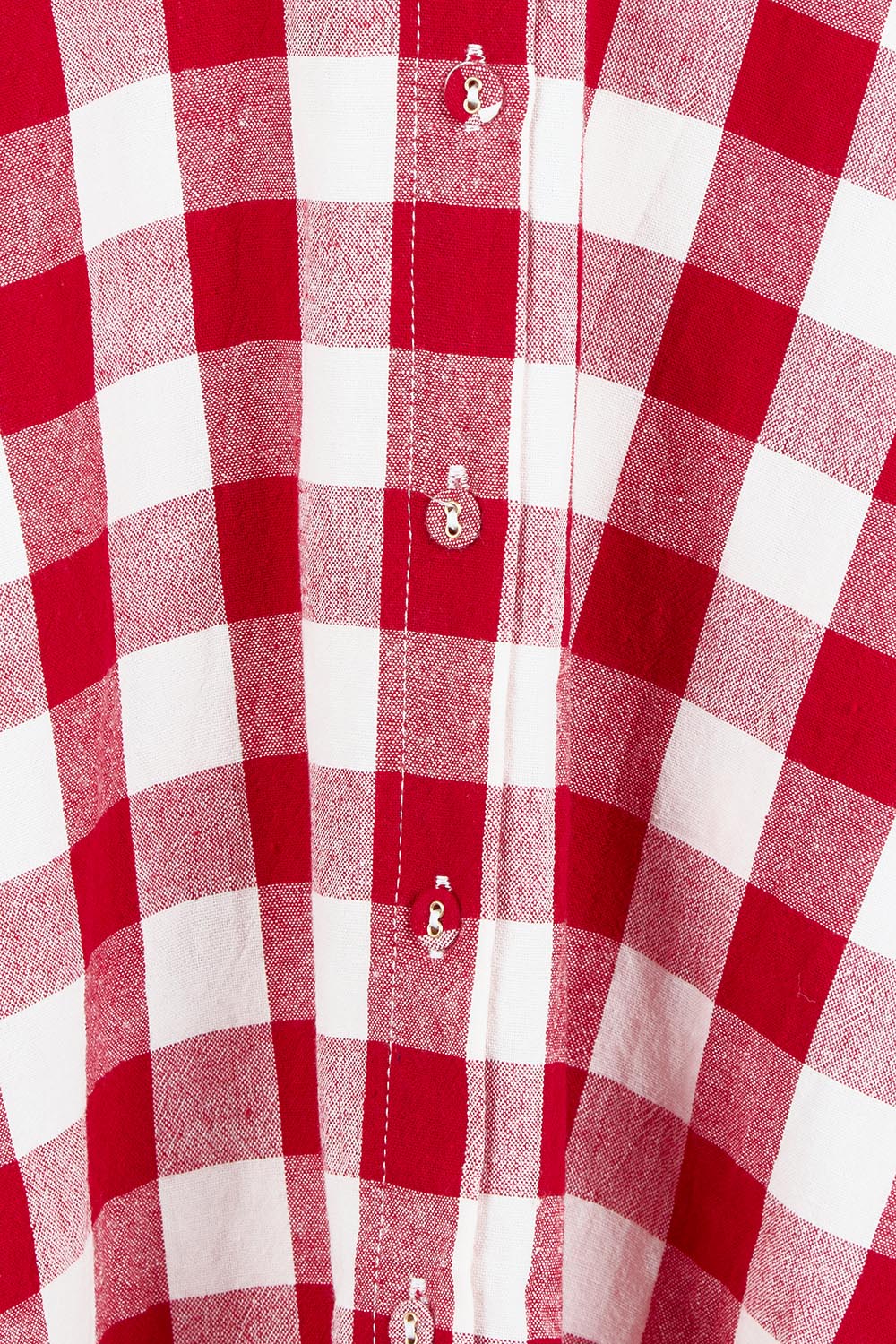 Product shot of the Musings Cotton Dress in colour Redgingham (Red), detail