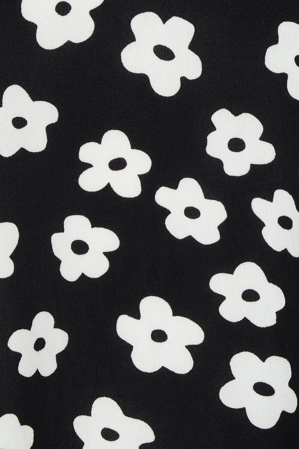 Product shot of the Veronica Top in colour Distydaisy (Black), detail