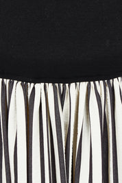 Product shot of the Daphne Dress in colour Blackstrip, detail