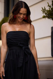 A model wearing the Avalon Cotton Linen Maxi Dress in colour Black (Black), from the front, cropped image