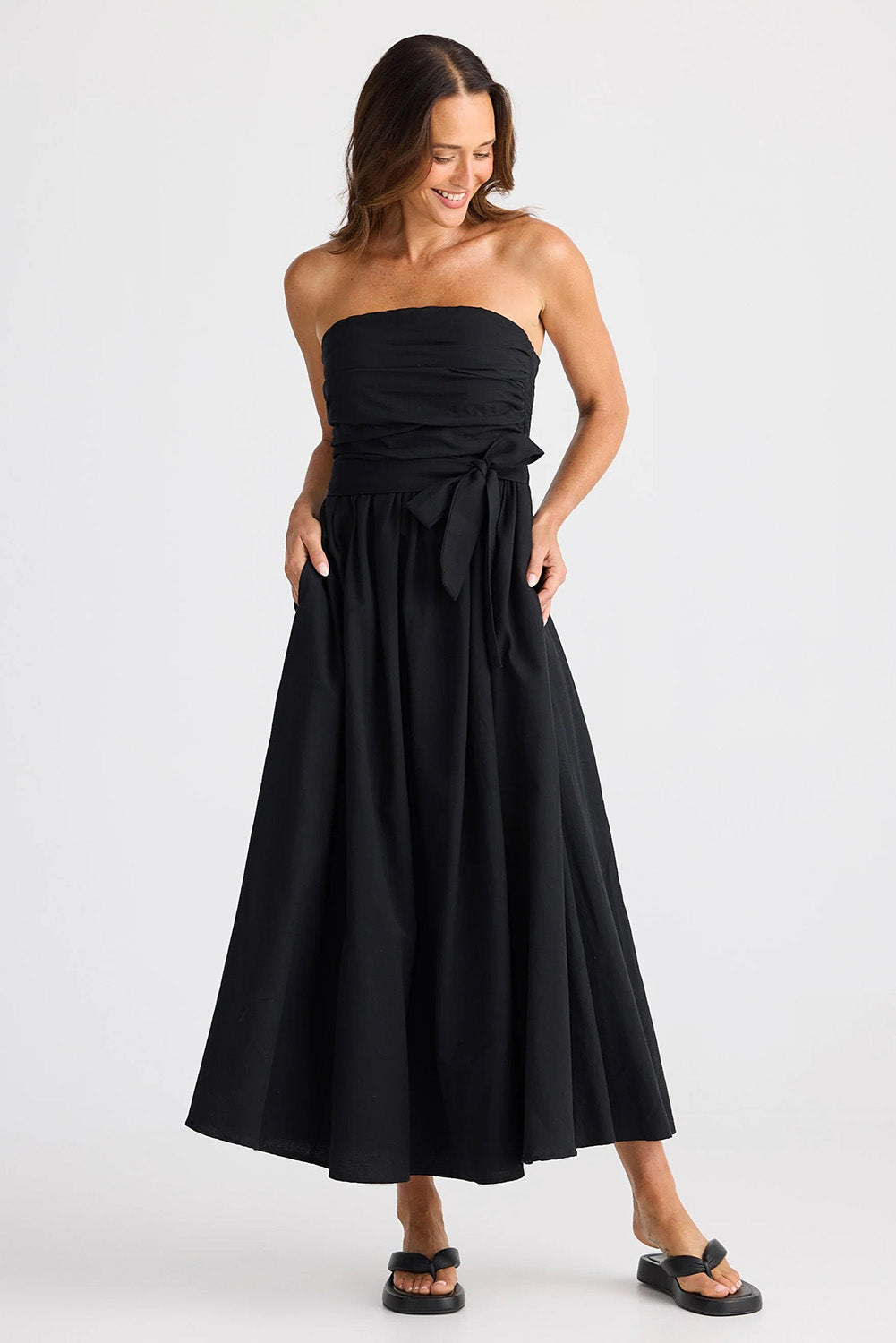 A model wearing the Avalon Cotton Linen Maxi Dress in colour Black (Black), from the front, showing the whole outfit