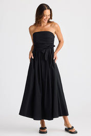 A model wearing the Avalon Cotton Linen Maxi Dress in colour Black (Black), from the front, showing the whole outfit