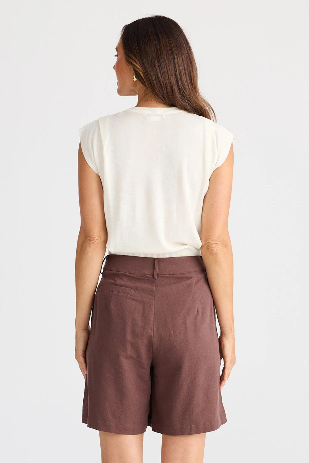 A model wearing the Eden Cotton Linen Blend Short in colour Chocolate, from the back