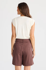 A model wearing the Eden Cotton Linen Blend Short in colour Chocolate, from the back