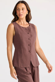 A model wearing the Eden Cotton Linen Blend Wasitcoat in colour Chocolate, from the front, cropped image