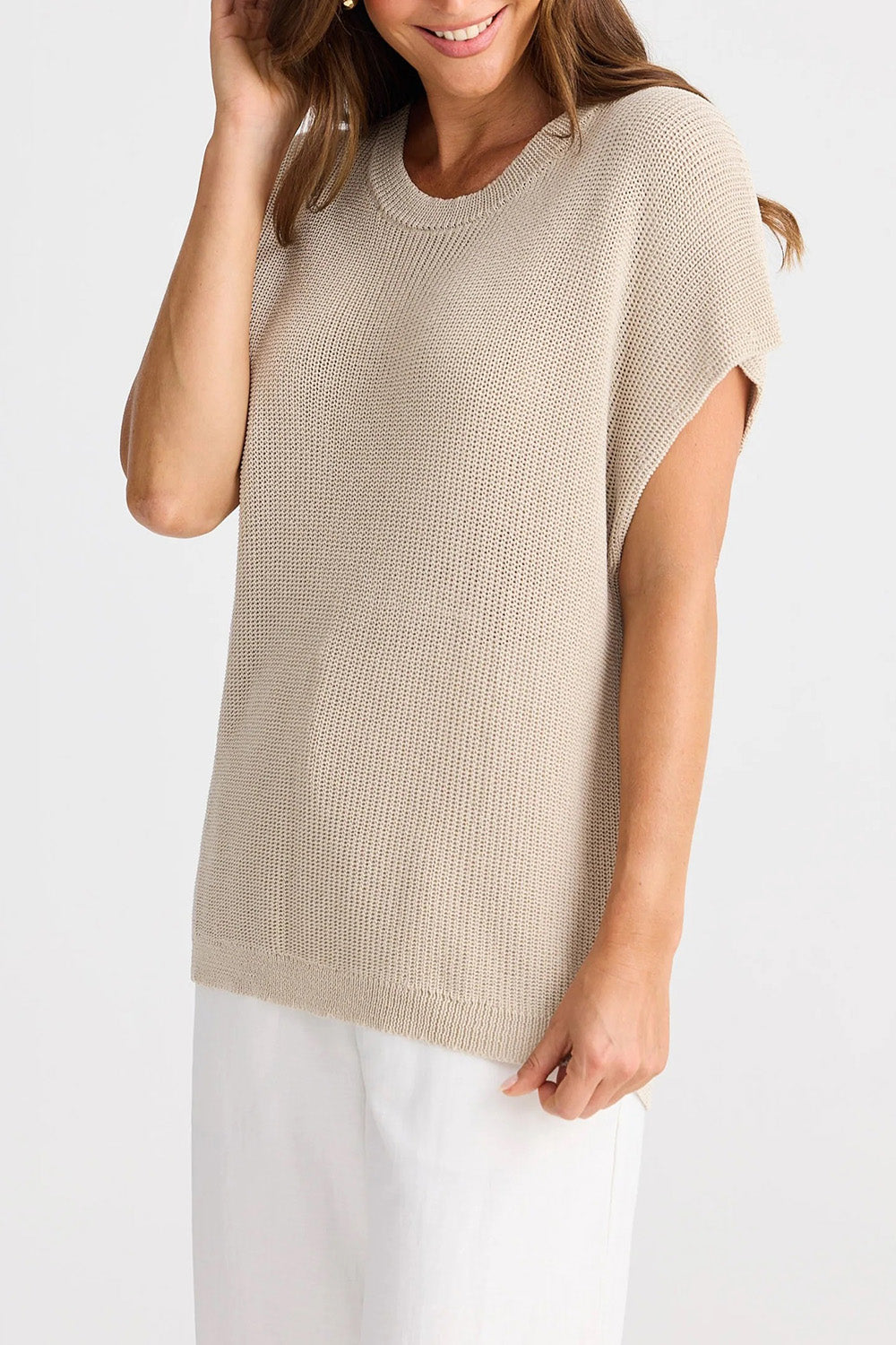 A model wearing the Limo Knit Tee in colour Natural, from the front, cropped image