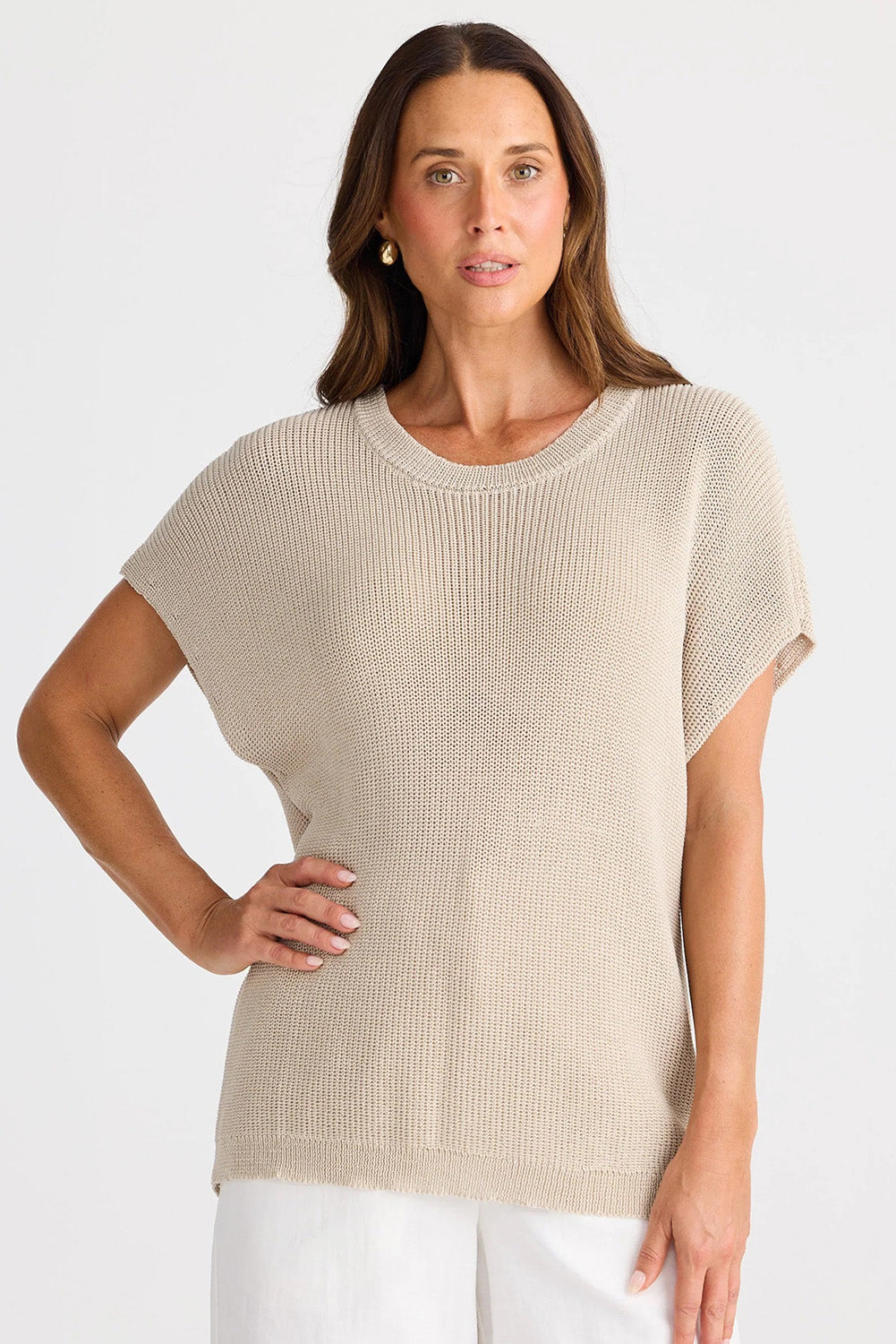 A model wearing the Limo Knit Tee in colour Natural, from the front, cropped image