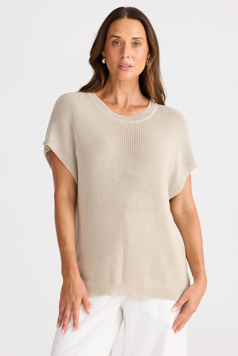 A model wearing the Limo Knit Tee in colour Natural, from the front, cropped image