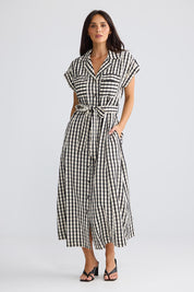 Model Genericm wearing size sample of the Portia Dress – Blkgingham in colour Blkgingham, from the front