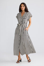 Model Genericm wearing size sample of the Portia Dress – Blkgingham in colour Blkgingham, from the front