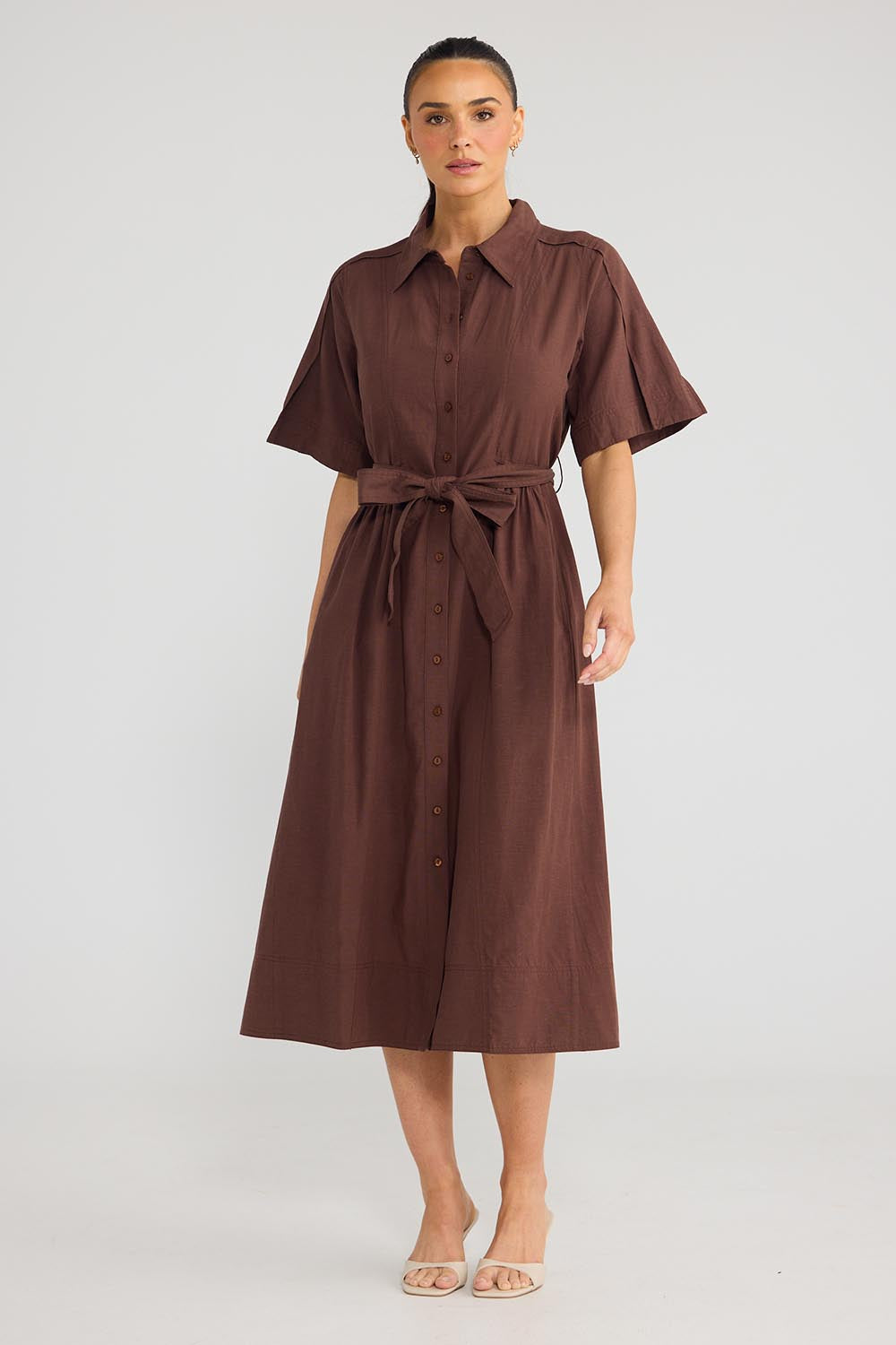 Model Genericm wearing size sample of the Leo Dress - Cocoa in colour Cocoa, from the front