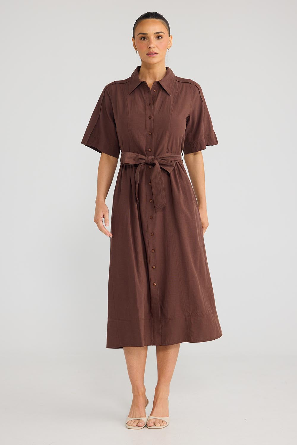 Model Genericm wearing size sample of the Leo Dress - Cocoa in colour Cocoa, from the front