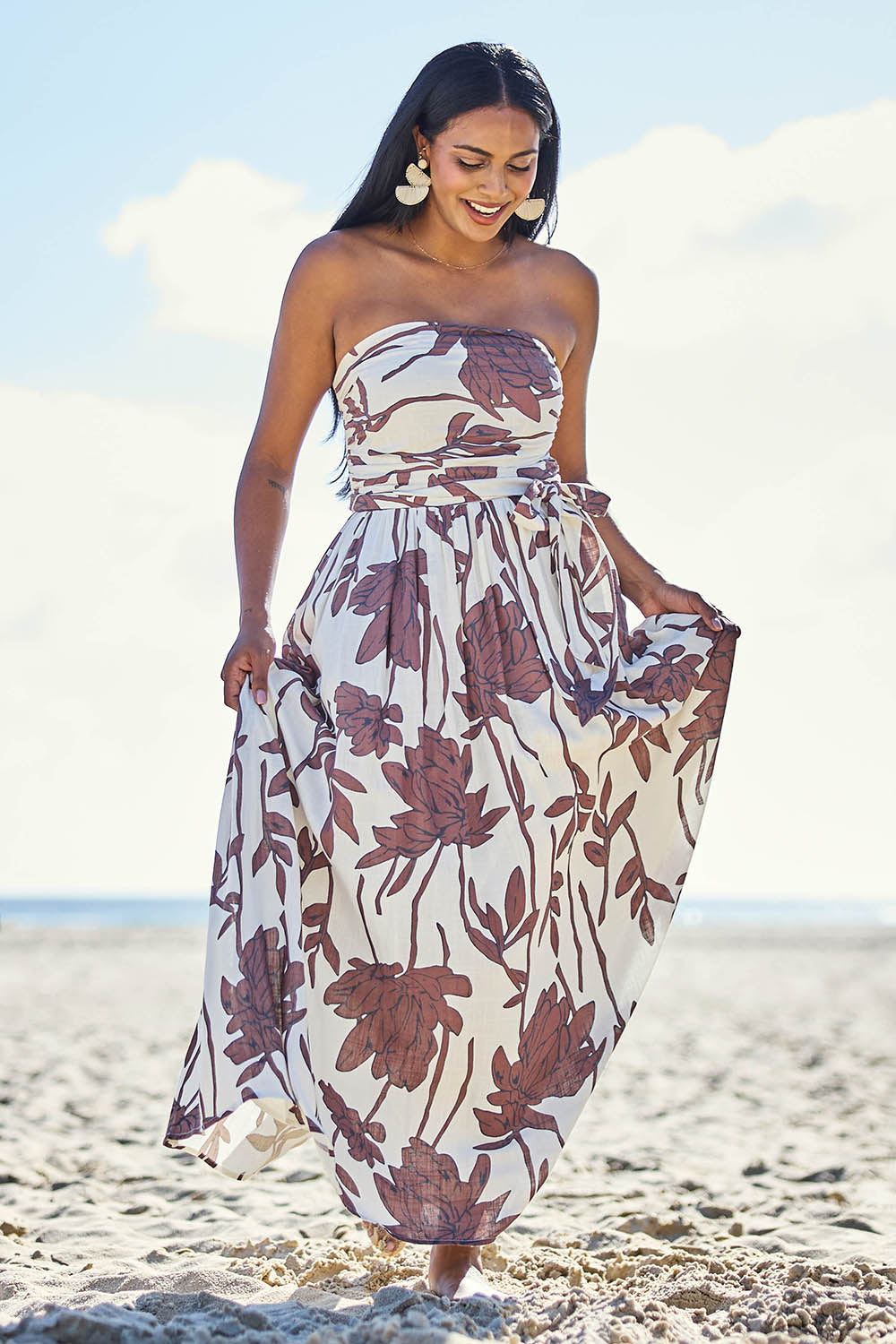 Model Eshan wearing size 10 of the Avalon Dress - Siennavine in colour Siennavine, from the front