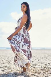 Model Eshan wearing size 10 of the Avalon Dress - Siennavine in colour Siennavine, from the front