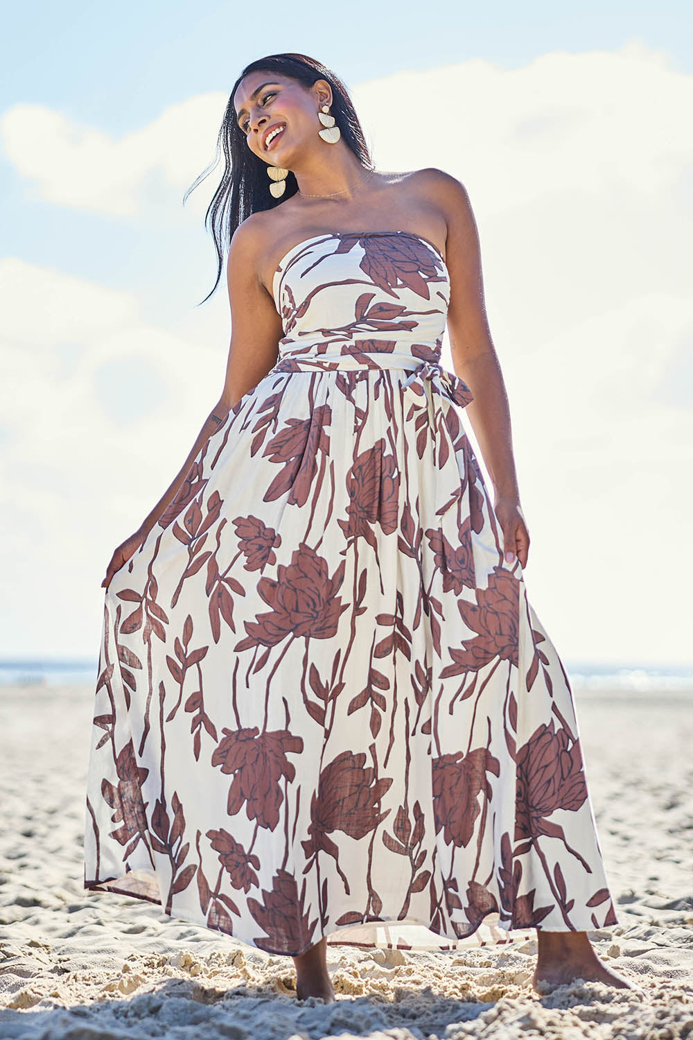 Model Eshan wearing size 10 of the Avalon Dress - Siennavine in colour Siennavine, from the front