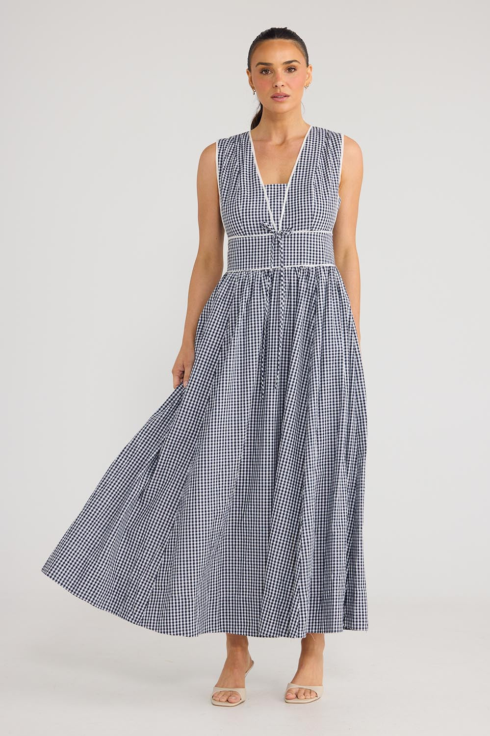 Model Genericm wearing size sample of the Pimms Dress - Navycheck in colour Navycheck, from the front
