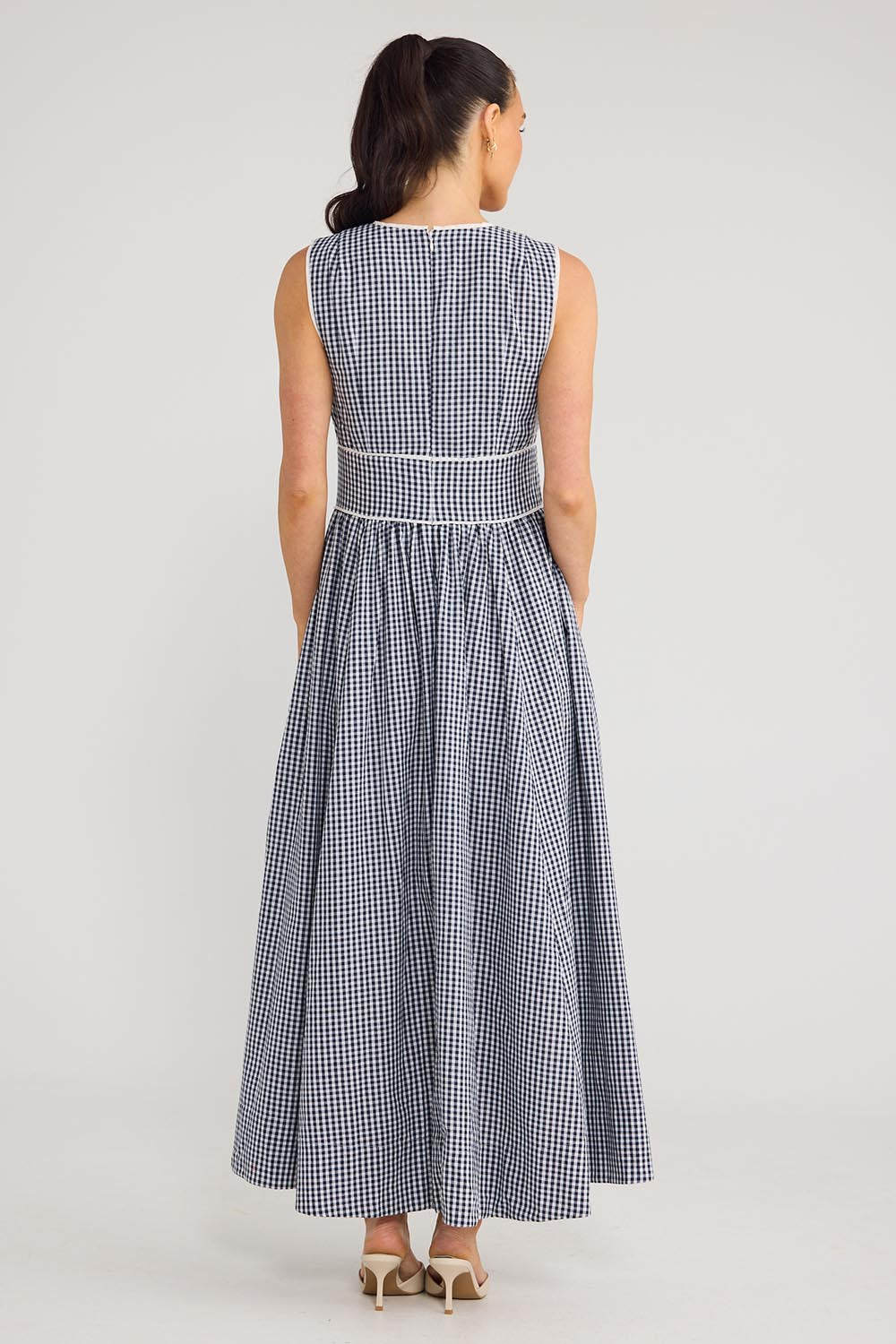 Model Genericm wearing size sample of the Pimms Dress - Navycheck in colour Navycheck, from the front