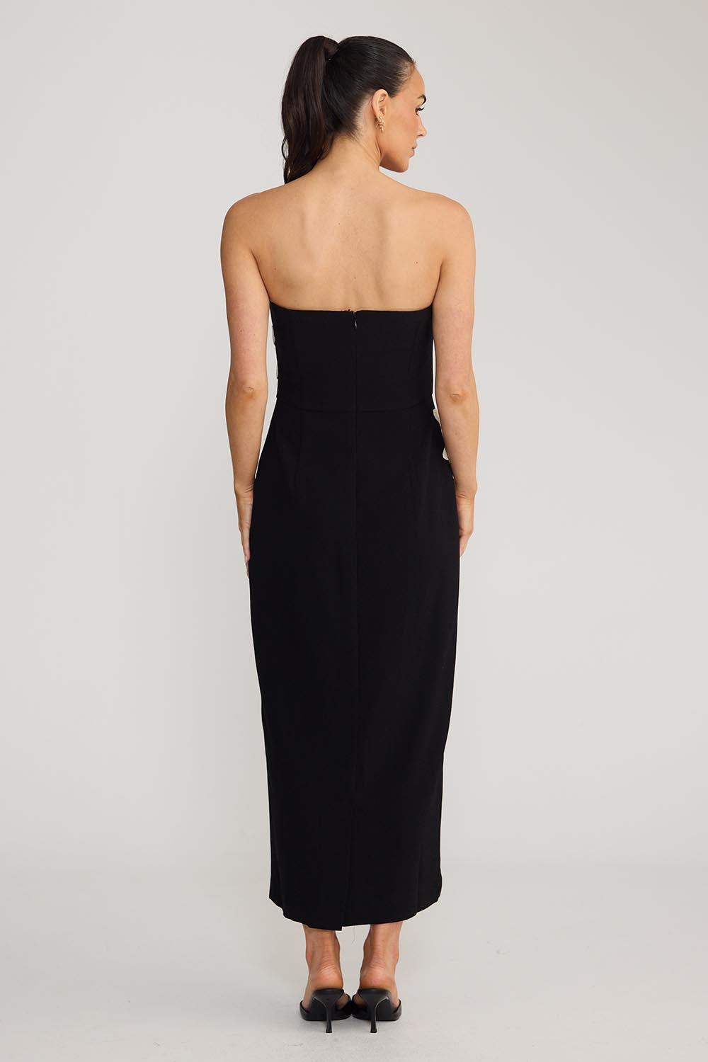 Model Genericm wearing size sample of the Jacqueline Dress - Black in colour Black, from the front